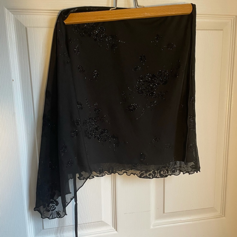 black wrap around skirt with floral shell
